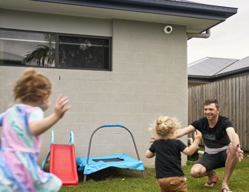 Family playing in yard